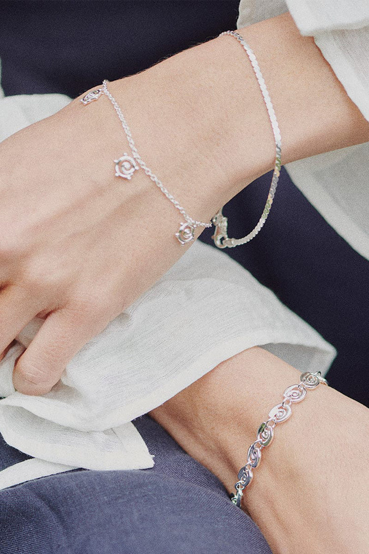 Daisy London Silver Spiral Sun Drop Bracelet