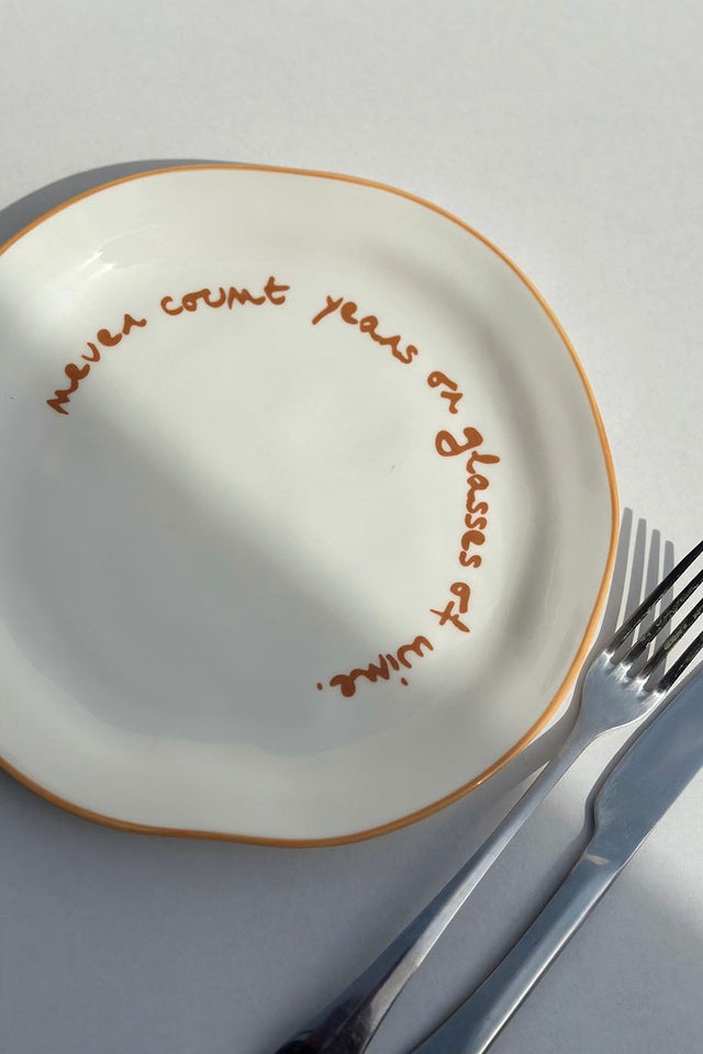 "Never Count Years or Glasses of Wine" Statement Plate